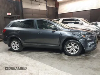 2013 Mazda CX-9 Touring z VIN JM3TB3CV0D0415199, wystawiony jako IAAI lot #42029040 z przebiegiem 154 404 mil mil oraz . Historia ofert i sprzedaży dostępna na DreamBid. Obrazek 13.