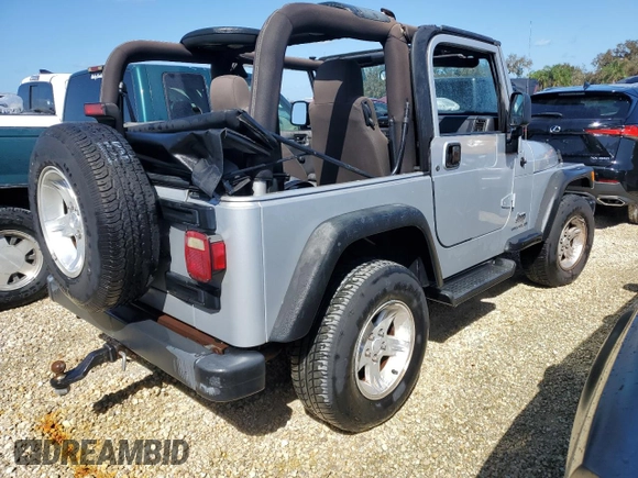 2004 Jeep Wrangler Sport with VIN 1J4FA49SX4P776775, listed as a Copart auction lot 74946824 with Not Provided miles and Salvage Title. Bid and sale history available at carsss.com. Image 3.