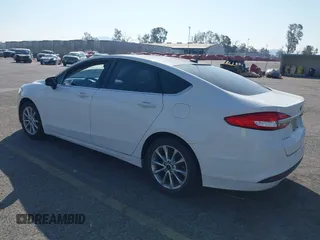 2017 Ford Fusion SE with VIN 3FA6P0H78HR235738, listed as a IAAI auction lot 41604054 with 172,896 mi miles. Bid and sale history available at carsss.com. Image 3.