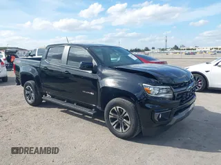 2021 Chevrolet Colorado 2WD Z71 with VIN 1GCGSDEN3M1132058, listed as a IAAI auction lot 41649837 with 74,057 mi miles and . Bid and sale history available at DreamBid. Image 1.