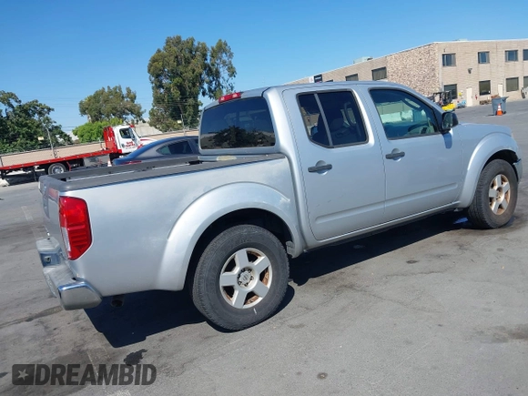 2007 Nissan Frontier SE with VIN 1N6AD07UX7C427340, listed as a IAAI auction lot 42664098 with 211,396 mi miles and . Bid and sale history available at DreamBid. Image 4.