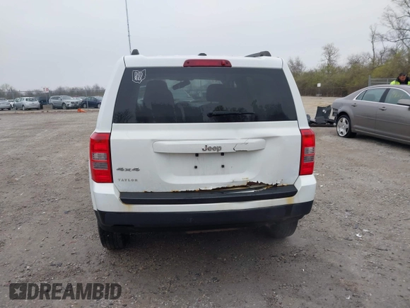 2014 Jeep Patriot Sport with VIN 1C4NJRBB1ED744101, listed as a IAAI auction lot 42009390 with 180,214 mi miles. Bid and sale history available at carsss.com. Image 17.