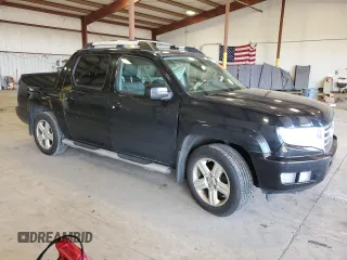 2013 Honda Ridgeline RTL with VIN 5FPYK1F50DB015599, listed as a Copart auction lot 50852074 with 159,411 mi miles and Salvage Title. Bid and sale history available at carsss.com. Image 4.