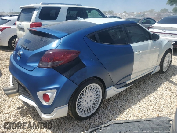 2016 Hyundai Veloster Turbo z VIN KMHTC6AEXGU261247, wystawiony jako Copart lot #52240215 z przebiegiem 137 238 mil mil oraz Czysty tytuł • Clean title. Historia ofert i sprzedaży dostępna na DreamBid. Obrazek 3.