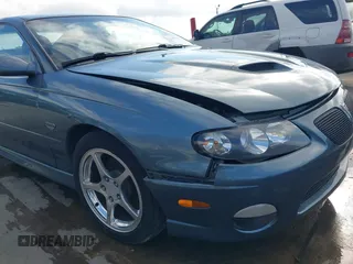 2006 Pontiac GTO with VIN 6G2VX12UX6L561098, listed as a IAAI auction lot 41487635 with 69,741 mi miles. Bid and sale history available at carsss.com. Image 18.