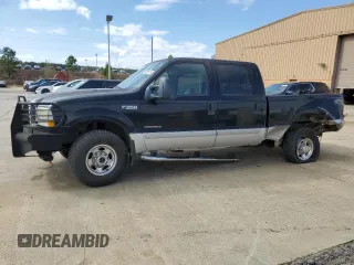 2002 Ford Super Duty F-250 XL with VIN 1FTNW21F92EA03004, listed as a Copart auction lot 49316115 with 209,520 mi miles and Salvage Title. Bid and sale history available at carsss.com. Image 1.