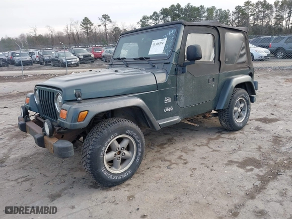 2003 Jeep Wrangler Sahara with VIN 1J4FA59SX3P344031, listed as a IAAI auction lot 41389374 with 206,407 mi miles. Bid and sale history available at carsss.com. Image 17.