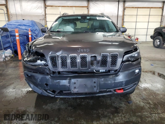 2019 Jeep Cherokee Trailhawk Elite with VIN 1C4PJMBX2KD112355, listed as a Copart auction lot 88948135 with 130,136 mi miles and Salvage Title. Bid and sale history available at carsss.com. Image 5.