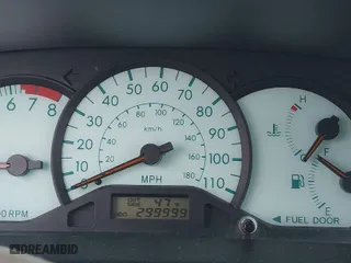 2004 Toyota Corolla CE with VIN 2T1BR32E24C309957, listed as a IAAI auction lot 41894304 with 299,999 mi miles. Bid and sale history available at carsss.com. Image 7.