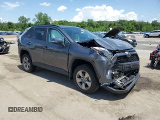 2023 Toyota RAV4 XLE with VIN 2T3P1RFV0PC331350, listed as a Copart auction lot 61234355 with 27,962 mi miles and Salvage title. Bid and sale history available at DreamBid. Image 4.
