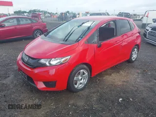 2017 Honda Fit LX with VIN JHMGK5H52HS019489, listed as a IAAI auction lot 42269808 with 148,751 mi miles and . Bid and sale history available at DreamBid. Image 2.