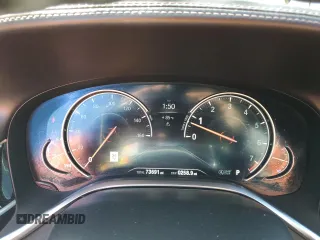 2019 BMW 7 Series 750i with VIN WBA7F0C5XKGM25771, listed as a Copart auction lot 47239195 with 73,691 mi miles and Salvage Title. Bid and sale history available at carsss.com. Image 9.