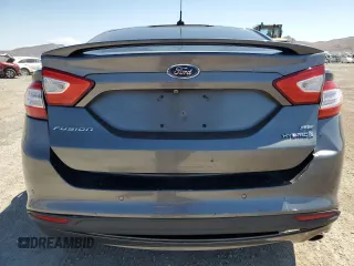 2014 Ford Fusion SE Hybrid with VIN 3FA6P0LU3ER306739, listed as a Copart auction lot 69887454 with 114,150 mi miles and Salvage title. Bid and sale history available at DreamBid. Image 6.