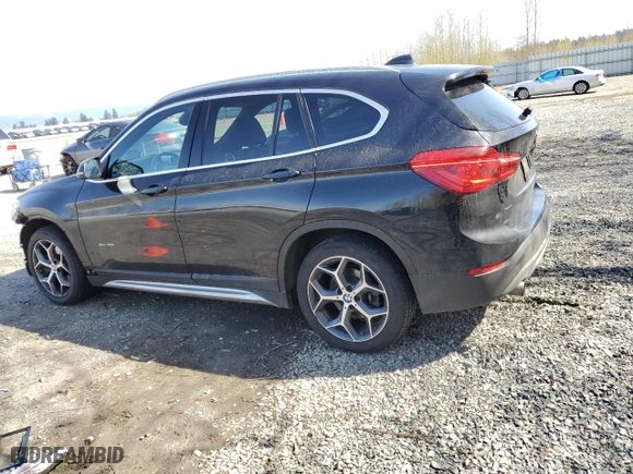 2018 BMW X1 xDrive28i with VIN WBXHT3C3XJ5K27379, listed as a Copart auction lot 52136315 with 79,428 mi miles and Clean Title. Bid and sale history available at carsss.com. Image 2.