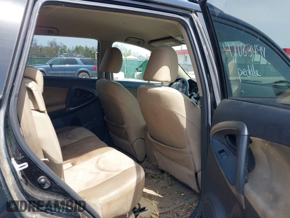 2009 Toyota RAV4 with VIN JTMZF33V29D004278, listed as a IAAI auction lot 42083497 with 218,217 mi miles. Bid and sale history available at carsss.com. Image 8.