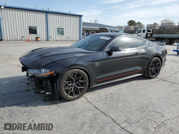 2021 Ford Mustang Mach 1 with VIN 1FA6P8R04M5552462, listed as a Copart auction lot 50628385 with 19,556 mi miles and Salvage Title. Bid and sale history available at carsss.com. Image 1.