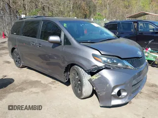 2015 Toyota Sienna SE with VIN 5TDXK3DC3FS682327, listed as a IAAI auction lot 41983156 with 141,640 mi miles. Bid and sale history available at carsss.com. Image 1.