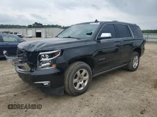 2015 Chevrolet Tahoe LTZ z VIN 1GNSCCKC3FR563824, wystawiony jako Copart lot #56217735 z przebiegiem 140 600 mil mil oraz Szkoda całkowita • Salvage title. Historia ofert i sprzedaży dostępna na DreamBid. Obrazek 1.