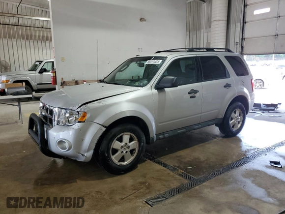 2012 Ford Escape XLT with VIN 1FMCU9D75CKC35544, listed as a Copart auction lot 65014435 with 135,740 mi miles and Salvage title. Bid and sale history available at DreamBid. Image 1.