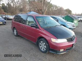 2002 Honda Odyssey EX-L z VIN 2HKRL18092H536976, wystawiony jako IAAI lot #40866644 z przebiegiem 263 854 mil mil oraz . Historia ofert i sprzedaży dostępna na DreamBid. Obrazek 1.