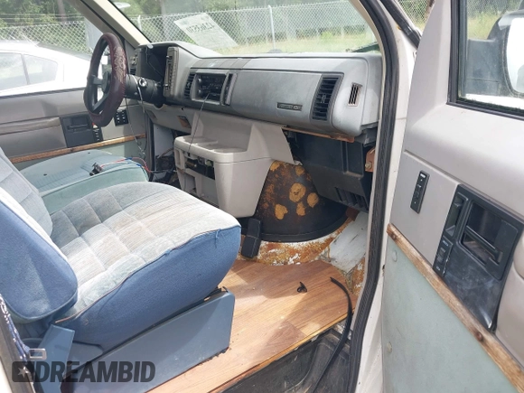 1991 Chevrolet Astro Cargo z VIN 1GBDM19Z7MB202913, wystawiony jako IAAI lot #42363530 z przebiegiem 191 695 mil mil oraz . Historia ofert i sprzedaży dostępna na DreamBid. Obrazek 5.