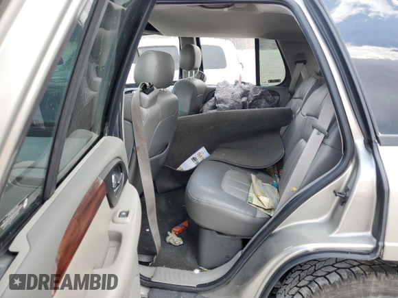 2002 GMC Envoy SLT with VIN 1GKDT13SX22380133, listed as a Copart auction lot 69816144 with 90,060 mi miles and Salvage Title. Bid and sale history available at DreamBid. Image 11.