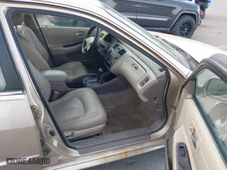 2002 Honda Accord Sdn EX with VIN 1HGCG56602A058660, listed as a IAAI auction lot 42117269 with 179,405 mi miles. Bid and sale history available at carsss.com. Image 5.