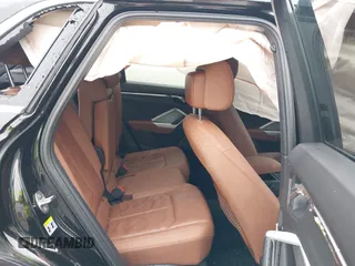 2021 Audi Q3 Premium with VIN WA1AUCF31M1131914, listed as a IAAI auction lot 41571543 with 35,477 mi miles and . Bid and sale history available at DreamBid. Image 8.