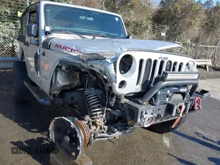 2011 Jeep Wrangler Rubicon with VIN 1J4BA6D10BL514776, listed as a IAAI auction lot 41487396 with 172,208 mi miles. Bid and sale history available at carsss.com. Image 6.