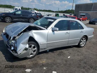 2002 Mercedes-Benz E-Class with VIN WDBJF65J12B393729, listed as a Copart auction lot 59722643 with 289,974 mi miles and Salvage Title. Bid and sale history available at carsss.com. Image 1.