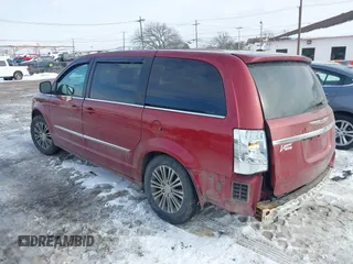 2014 Chrysler Town & Country S with VIN 2C4RC1HG6ER234680, listed as a IAAI auction lot 41541817 with 117,650 mi miles. Bid and sale history available at carsss.com. Image 3.