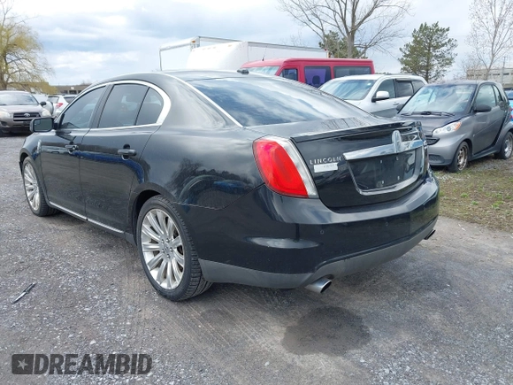 2011 Lincoln MKS EcoBoost with VIN 1LNHL9FTXBG600398, listed as a IAAI auction lot 42047512 with 114,274 mi miles and . Bid and sale history available at DreamBid. Image 3.