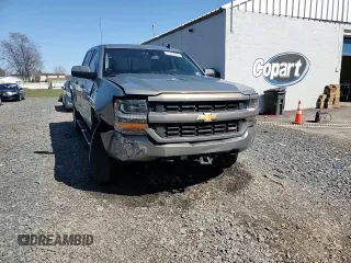 2017 Chevrolet Silverado 1500 LT with VIN 3GCUKREC0HG335785, listed as a Copart auction lot 51456305 with 104,614 mi miles and Salvage Title. Bid and sale history available at DreamBid. Image 13.