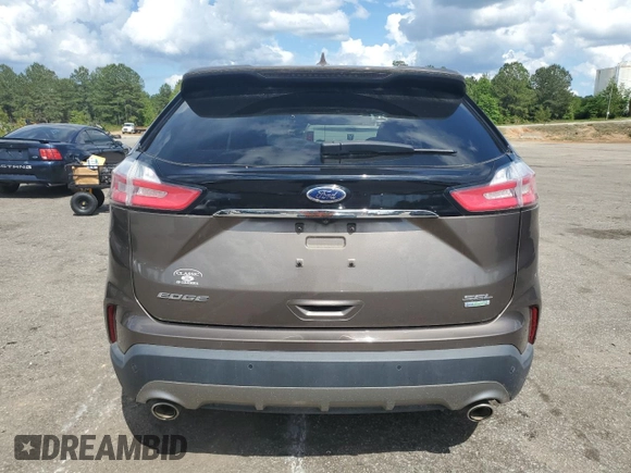 2019 Ford Edge SEL z VIN 2FMPK3J98KBB59420, wystawiony jako Copart lot #55733465 z przebiegiem 55 132 mil mil oraz Szkoda całkowita • Salvage title. Historia ofert i sprzedaży dostępna na DreamBid. Obrazek 6.