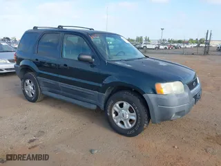 2003 Ford Escape XLT Popular 2 with VIN 1FMYU93113KE18944, listed as a IAAI auction lot 42056372 with 244,942 mi miles. Bid and sale history available at carsss.com. Image 1.