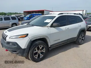 2015 Jeep Cherokee Trailhawk with VIN 1C4PJMBS6FW687718, listed as a IAAI auction lot 42505169 with 122,526 mi miles and . Bid and sale history available at DreamBid. Image 12.