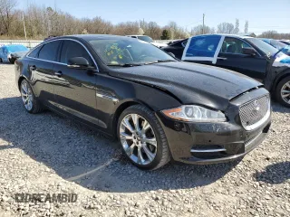 2012 Jaguar XJ with VIN SAJWA1CB5CLV29023, listed as a Copart auction lot 48300165 with 42,725 mi miles and Salvage title. Bid and sale history available at DreamBid. Image 4.