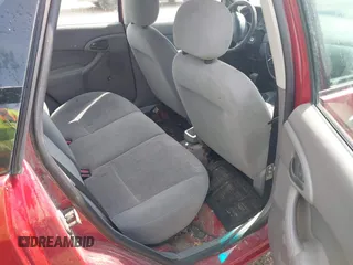 2001 Ford Focus LX with VIN 1FAFP33P41W175131, listed as a IAAI auction lot 41720865 with 151,280 mi miles and . Bid and sale history available at carsss.com. Image 8.