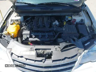 2010 Chrysler Sebring Limited with VIN 1C3CC5FD9AN199621, listed as a IAAI auction lot 42616882 with 110,512 mi miles and . Bid and sale history available at DreamBid. Image 10.