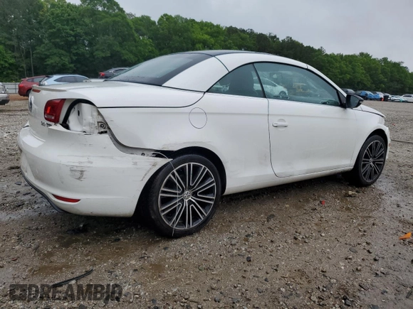 2013 Volkswagen Eos Komfort with VIN WVWBW8AH0DV003581, listed as a Copart auction lot 54498655 with 95,203 mi miles and Salvage Title. Bid and sale history available at DreamBid. Image 3.