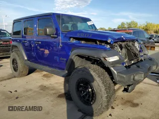 2020 Jeep Wrangler Unlimited Willys with VIN 1C4HJXDG0LW264742, listed as a Copart auction lot 73247804 with 31,745 mi miles and Salvage title. Bid and sale history available at DreamBid. Image 4.