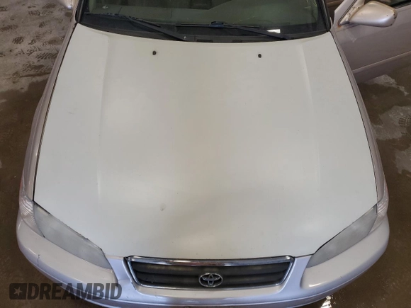 2000 Toyota Camry CE z VIN 4T1BG22K2YU742415, wystawiony jako Copart lot #55763165 z przebiegiem 245 821 mil mil oraz Czysty tytuł • Clean title. Historia ofert i sprzedaży dostępna na DreamBid. Obrazek 11.