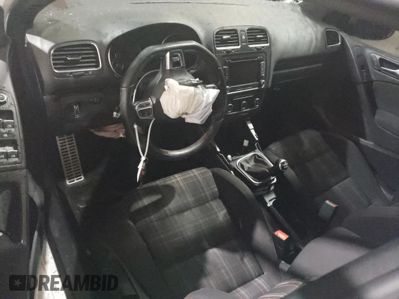 2013 Volkswagen GTI с VIN WVWGD7AJ1DW124574, выставлен на аукционе Copart как лот 44914075 с пробегом Не указан миль и Списание • Salvage title. История ставок и продаж доступна на DreamBid. Изображение 8.