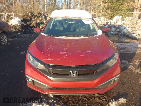 2021 Honda Civic Sedan EX-L with VIN 2HGFC1F77MH703528, listed as a IAAI auction lot 41284423 with 57,642 mi miles. Bid and sale history available at carsss.com. Image 12.