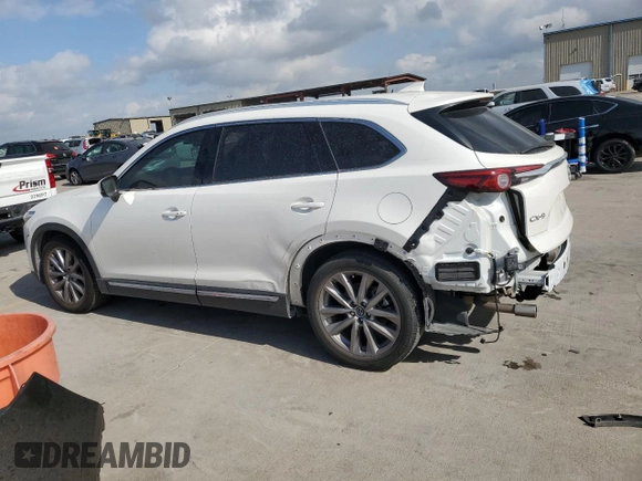 2021 Mazda CX-9 Grand Touring with VIN JM3TCADY2M0519977, listed as a Copart auction lot 76137724 with 31,306 mi miles and Salvage title. Bid and sale history available at DreamBid. Image 2.