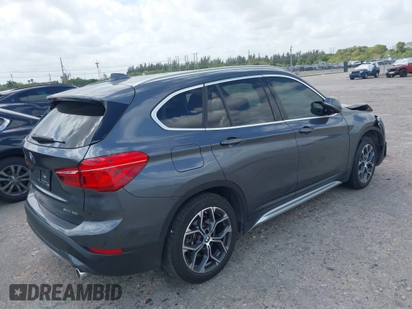 2022 BMW X1 sDrive28i with VIN WBXJG7C00N5U59675, listed as a IAAI auction lot 41915231 with 34,983 mi miles. Bid and sale history available at carsss.com. Image 4.
