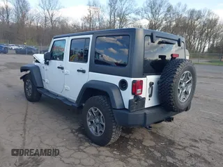 2015 Jeep Wrangler Unlimited Rubicon with VIN 1C4BJWFGXFL507315, listed as a IAAI auction lot 42059720 with 90,189 mi miles and . Bid and sale history available at DreamBid. Image 3.