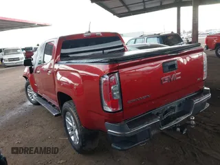 2015 GMC Canyon 2WD SLT with VIN 1GTG5CE39F1225427, listed as a IAAI auction lot 41453753 with 115,801 mi miles. Bid and sale history available at carsss.com. Image 3.