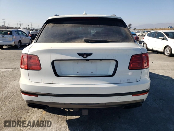 2018 Bentley Bentayga Signature z VIN SJAAC4ZV9JC020797, wystawiony jako Copart lot #72076174 z przebiegiem 78 619 mil mil oraz Szkoda całkowita • Salvage title. Historia ofert i sprzedaży dostępna na DreamBid. Obrazek 6.
