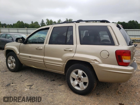 2001 Jeep Grand Cherokee Limited with VIN 1J4GW58S11C649736, listed as a Copart auction lot 66080214 with 199,584 mi miles and Salvage Title. Bid and sale history available at carsss.com. Image 2.